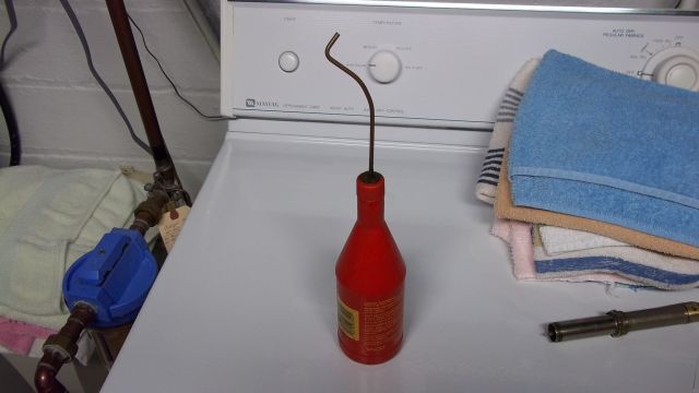 1334622101-Alcohol_Bottle_opt.jpg