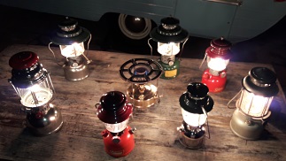 1483860326-Coleman_lanterns_with_1956_Rainbow_trailer.jpg