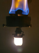 Chaleur Intens Lumiere S A lamp lit mantle.jpg