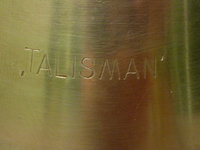 1346597736-Talisman_Kerona__stamped_brand_mark.jpg