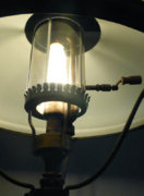 Unknown table lamp lit with mica globe 1.jpg