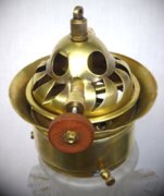 Lilor model 1935 vent and cleaning needle control wheel front.jpg