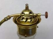 Lilor model 1935 vent and cleaning needle control wheel side wiev.jpg