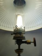 Louis Runge gravity lamp lit mantle with shade.jpg