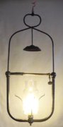 1906 The Pitner Light hw lamp lit mantle with chimney.jpg